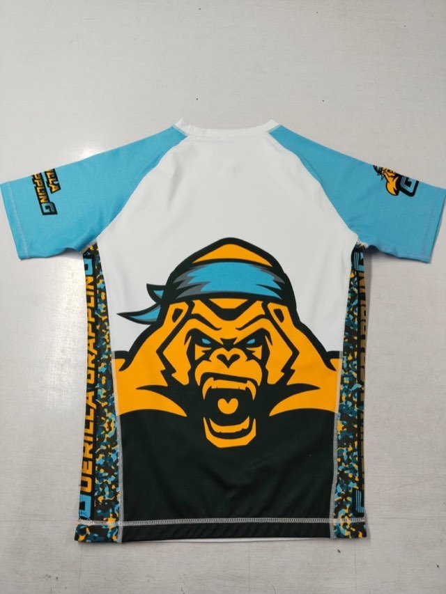 Sublimated no-gi rashguard flat-lay