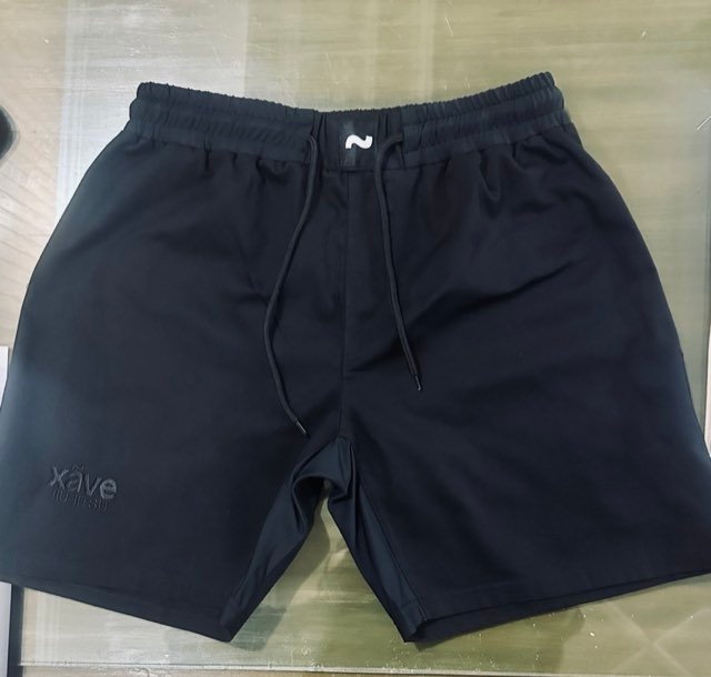 Grappling shorts and spats flat-lay